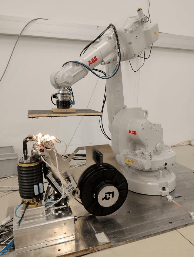 Figure 4 for An Automated Tape Laying System Employing a Uniaxial Force Control Device