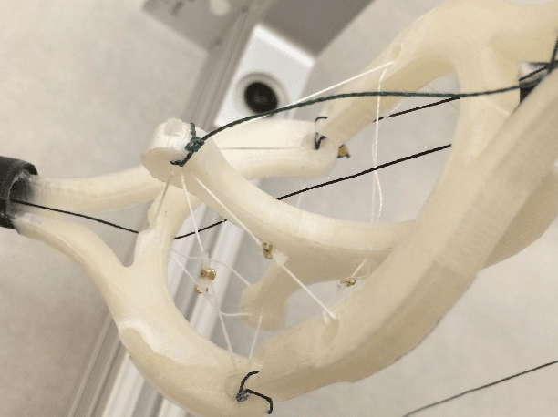 Figure 1 for A light-weight, multi-axis compliant tensegrity joint