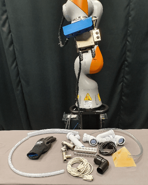 Figure 1 for Metrics and Benchmarks for Remote Shared Controllers in Industrial Applications